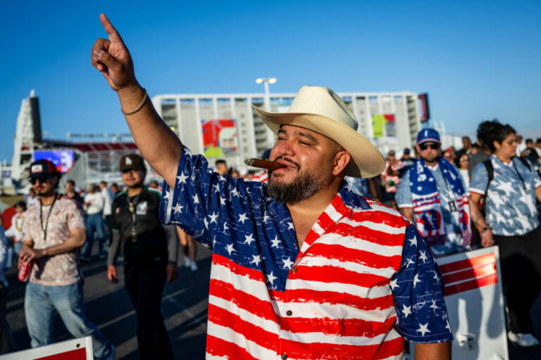 Naseem Farooqi celebrates the U.S. team victory as he leaves the stadium in Santa Clara.