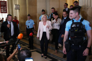 Le Pen says she’ll run for French presidency next year despite court-ordered monitor