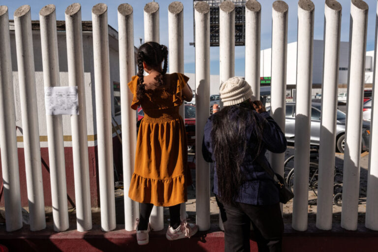 Asylum-seekers wait for news on the CBP One appointments at El Chaparral crossing port in Tijuana, Baja California state, Mexico, on January 21, 2025.