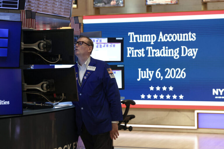 A trader moments before US President Donald Trump rings the opening bell of the New York Stock Exchange (NYSE) in New York on July 6, 2026 from the Oval Office in celebration of the First Day of trading of Trump Accounts