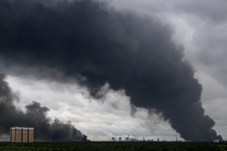 Black smoke rises from the area of the Russian oil producer Gazprom Neft's oil refinery on the outskirts of Moscow on Thursday.