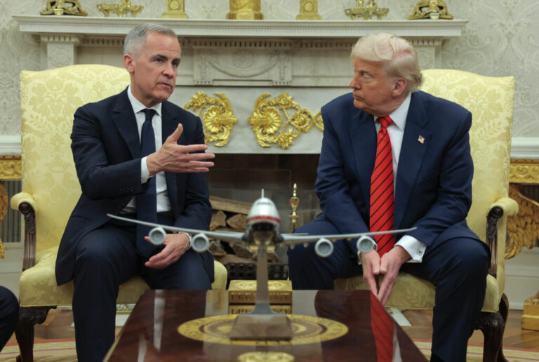 President Trump meets with Canadian Prime Minister Mark Carney in the Oval Office at the White House in Washington, D.C., on May 6, 2025. Carney's government on Sunday said it would scrap a tax on U.S. tech companies after Trump threatened higher tariffs on Canadian goods.