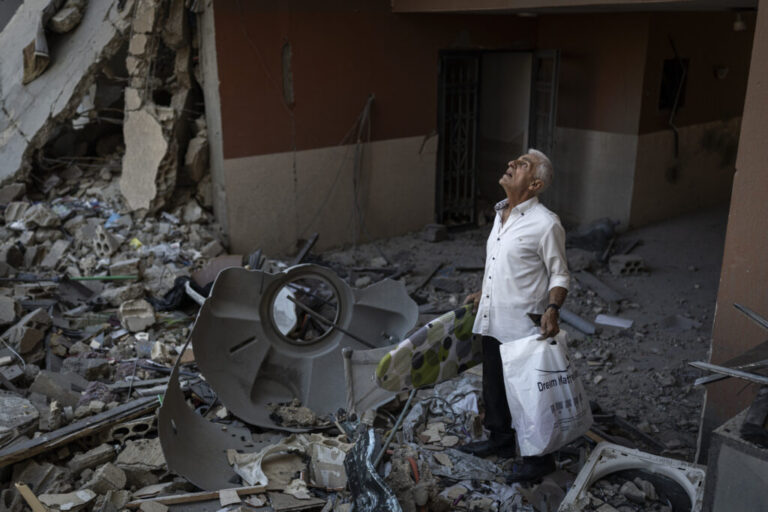 Najib Ayyad checks his apartment in Nabatieh, heavily damaged and likely to be demolished. “It was my life’s work to own this apartment,” he says. Now staying at his daughter’s home in Beirut, he has returned to salvage what remains for his children. The apartment overlooks Beaufort Castle, a national symbol of deep personal meaning for him, now occupied by Israeli forces.