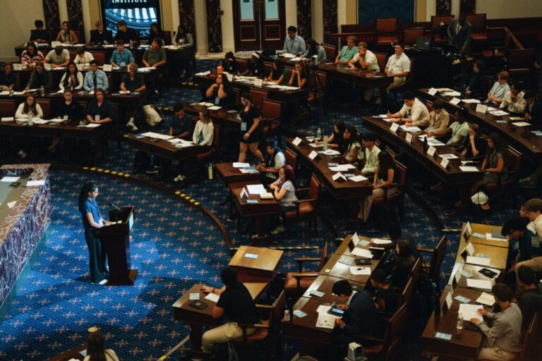 High schooler Leena Jain of Louisiana addresses her fellow senators in a replica of the U.S. Senate chamber.