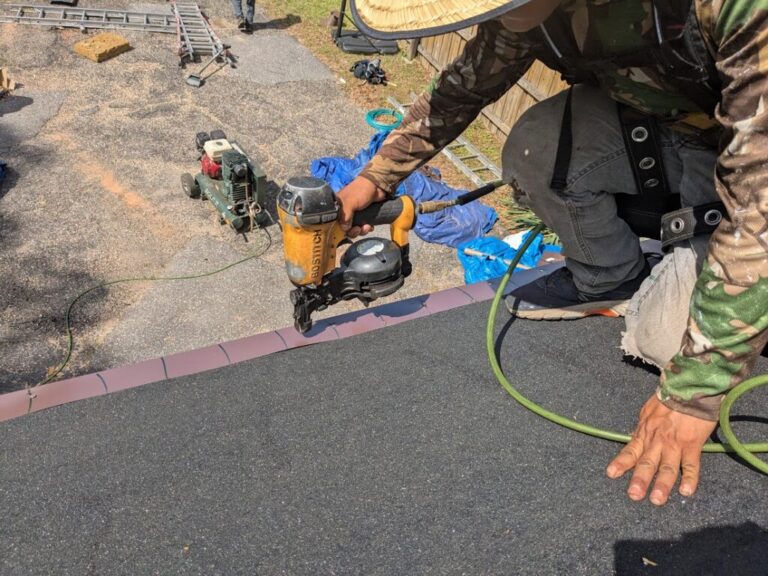 Contractors install a roof in Mobile County, Ala., designed to better withstand hurricanes. Other states are adopting similar programs to incentivize disaster preparation through insurance discounts.