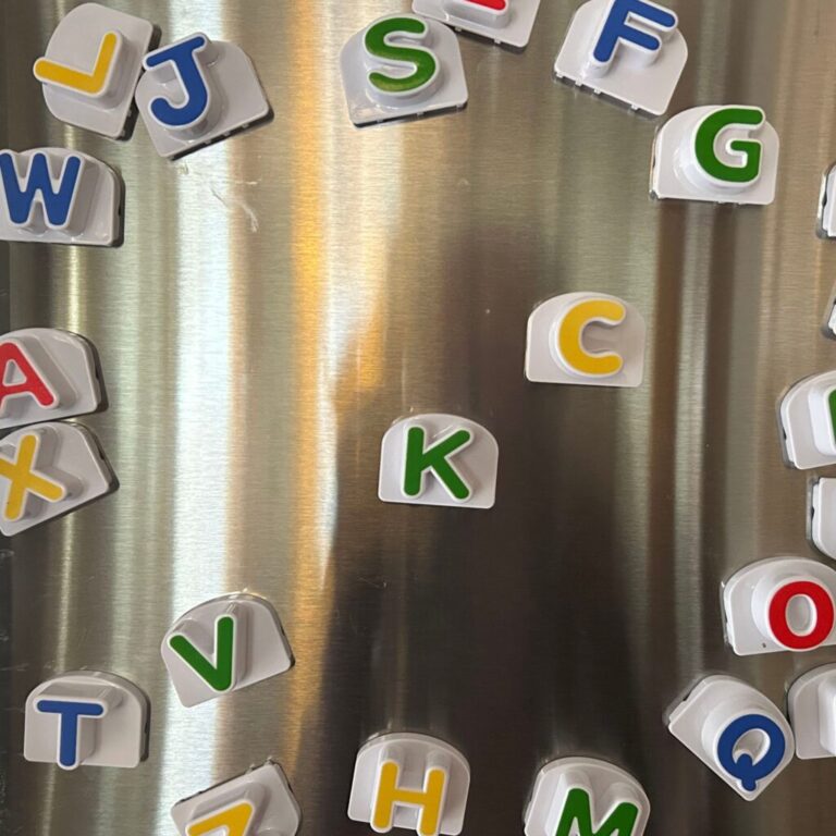 Alphabet letters on the fridge with