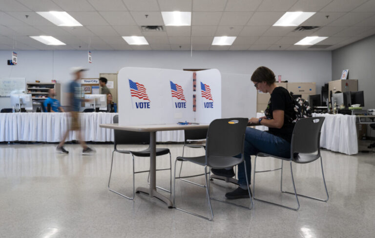 A voter fills out their ballot at the Minneapolis Elections & Voter Services building on September 20, 2024 in Minneapolis, Minn.