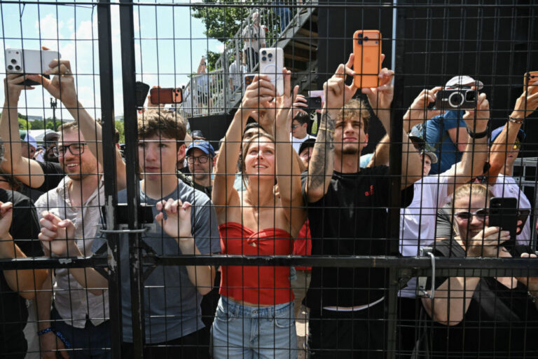 Spectators look on during the IndyCar Freedom 250 Grand Prix.