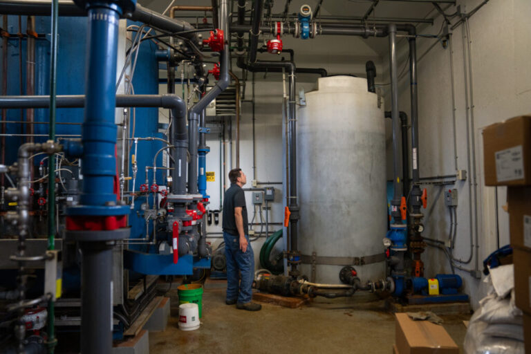 Chris Hughes, assistant water and wastewater operator for the towns of Cavendish and Proctorsville in Vermont, deals with the effects of a power outage at a drinking water facility.