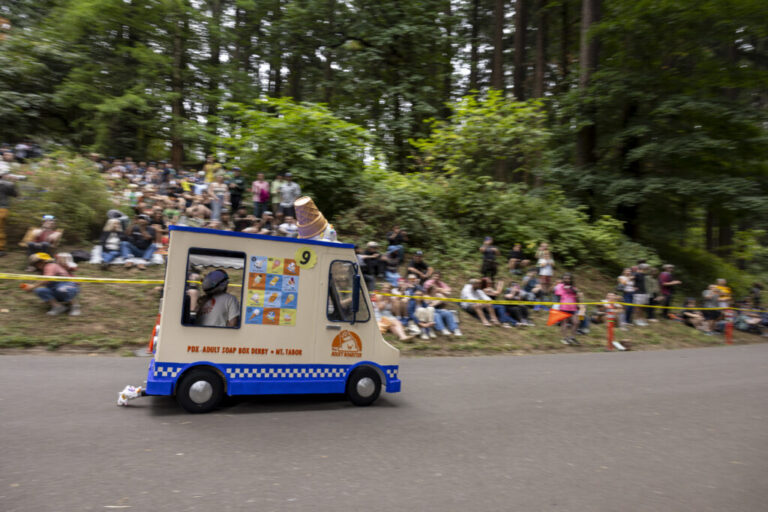 Racers a few moments after the start of the derby at Mt. Tabor Park during the 27th Portland Adult Soap Box Derby on Aug. 15 in Portland, Ore.
