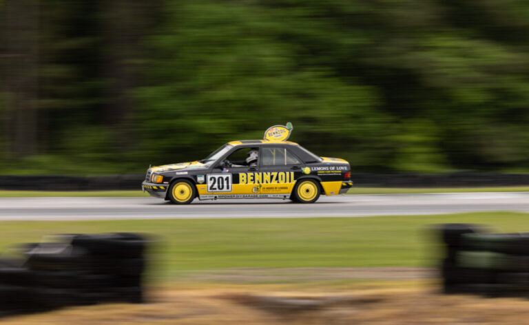 A 1990 Mercedes-Benz 190E, adorned with a lemon on the roof, participates in the 24 Hours of Lemons event in Kershaw County, S.C., on April 26. The race features cars that cost $500 or less.