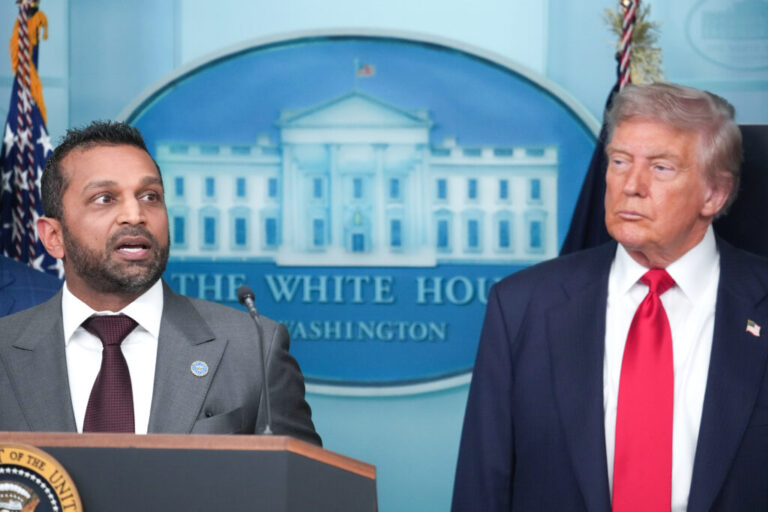 FBI Director Kash Patel delivers remarks as U.S. President Donald Trump looks on during a White House press conference in August 2025.