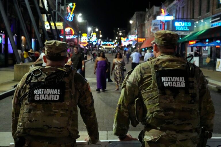 Members of the National Guard stand watch on Beale St., Friday, July 17, 2026, in Memphis, Tenn.