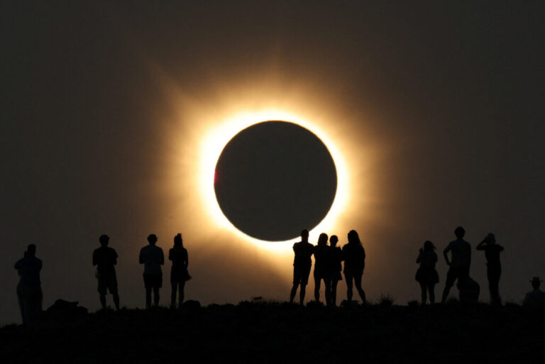 The moon completely covers the sun during a total solar eclipse
