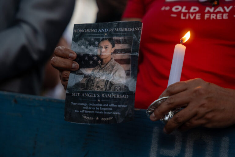 A candlelight vigil is held for Army Sgt. Angel Rampersad in front of her family's home on July 27, 2026 in the Ozone Park area of New York City. Rampersad was one of three American service members killed in action on July 17 at Muwaffaq Salti Air Base in Jordan. Her funeral is scheduled for Friday.
