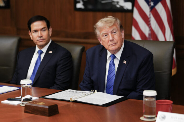 President Donald Trump, alongside US Secretary of State Marco Rubio (L), speaks during a Cabinet meeting at Camp David in Maryland, on July 31, 2026.