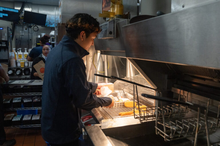 Jason Guevara, a kitchen manager, prepares hash browns.
