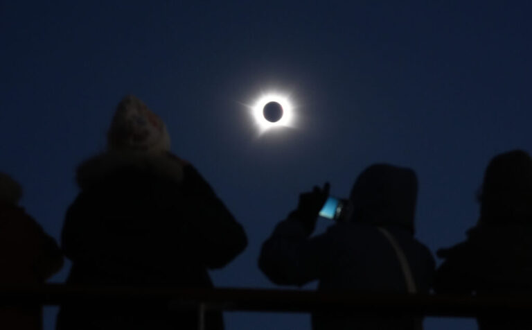 A view of the total eclipse, as the Moon passes between the Earth and the Sun, as seen from on board the Ambassador cruise ship Ambition, off the coast of Greenland.