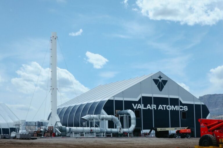 This photo shows a large tentlike structure that says Valar Atomics on it.