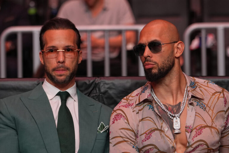 Andrew Tate, right, and his brother Tristan arrive an event, April 11, 2026, in Miami.