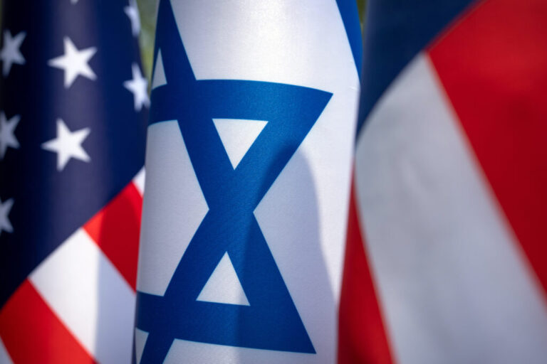U.S. and Israel flags stand outside of the White House, Monday, July 27, 2026, in Washington.