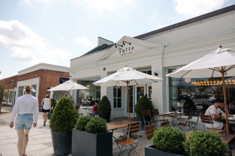 People walk by Tatte Bakery & Café, a local chain with locations in New Jersey and New York.