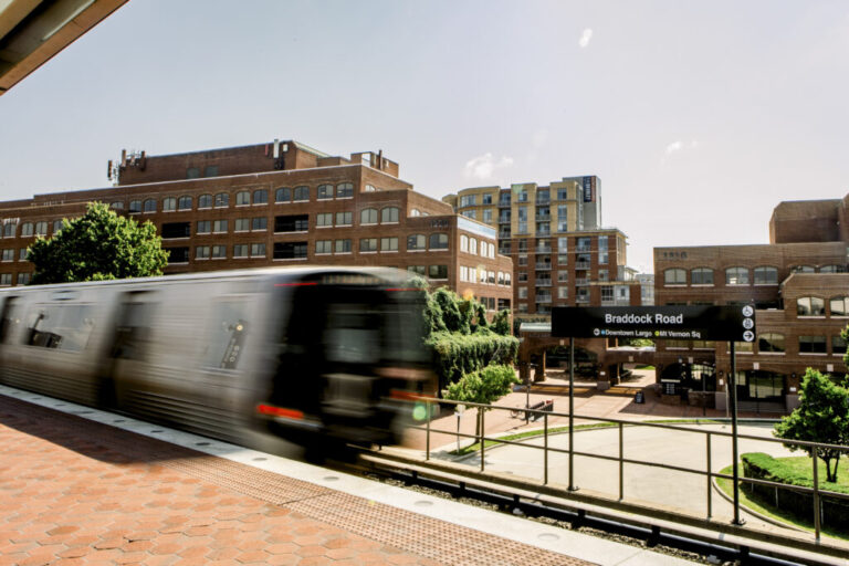 The Metro passes in front of 1320 Braddock Place in Alexandria, VA on July 29, 2026.