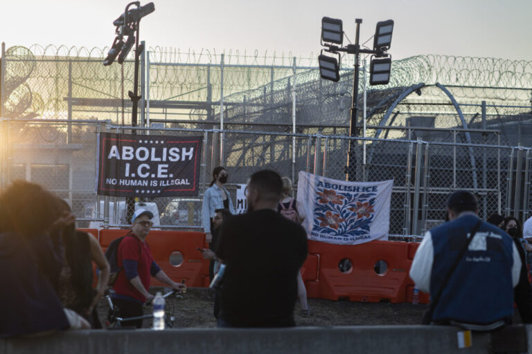 Protesters stand outside Delaney Hall detention center on June 3, 2026.