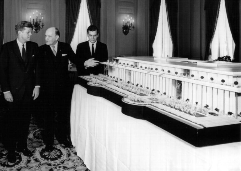 President John F. Kennedy, left, looks at a model of the Kennedy Center in Washington, DC., 1963.
