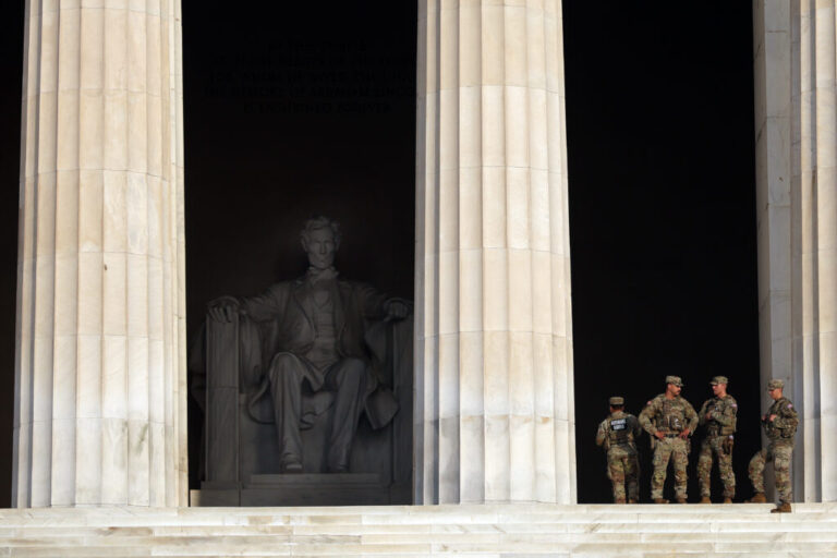 Members of the Army National Guard patrol at the Lincoln Memorial on July 2 in Washington, D.C.
