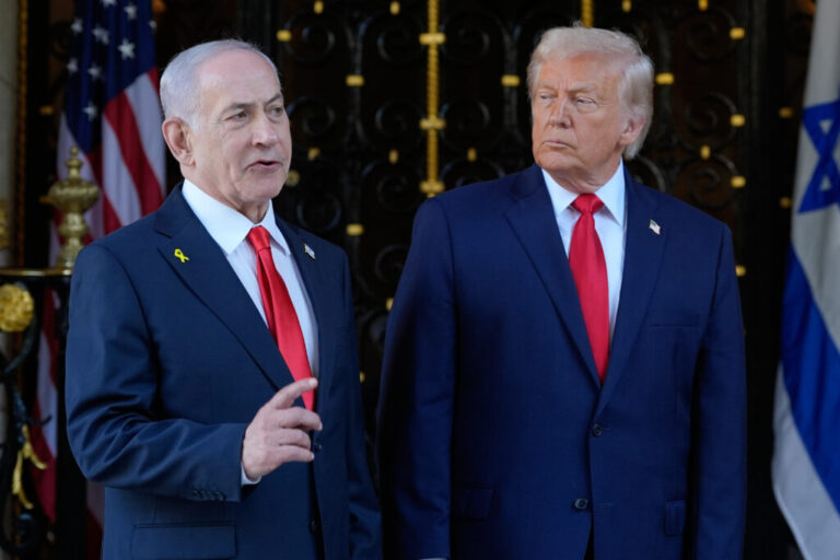 President Donald Trump listens as Israel's Prime Minister Benjamin Netanyahu speaks at President Donald Trump's Mar-a-Lago club, Dec. 29, 2025, in Palm Beach, Fla.
