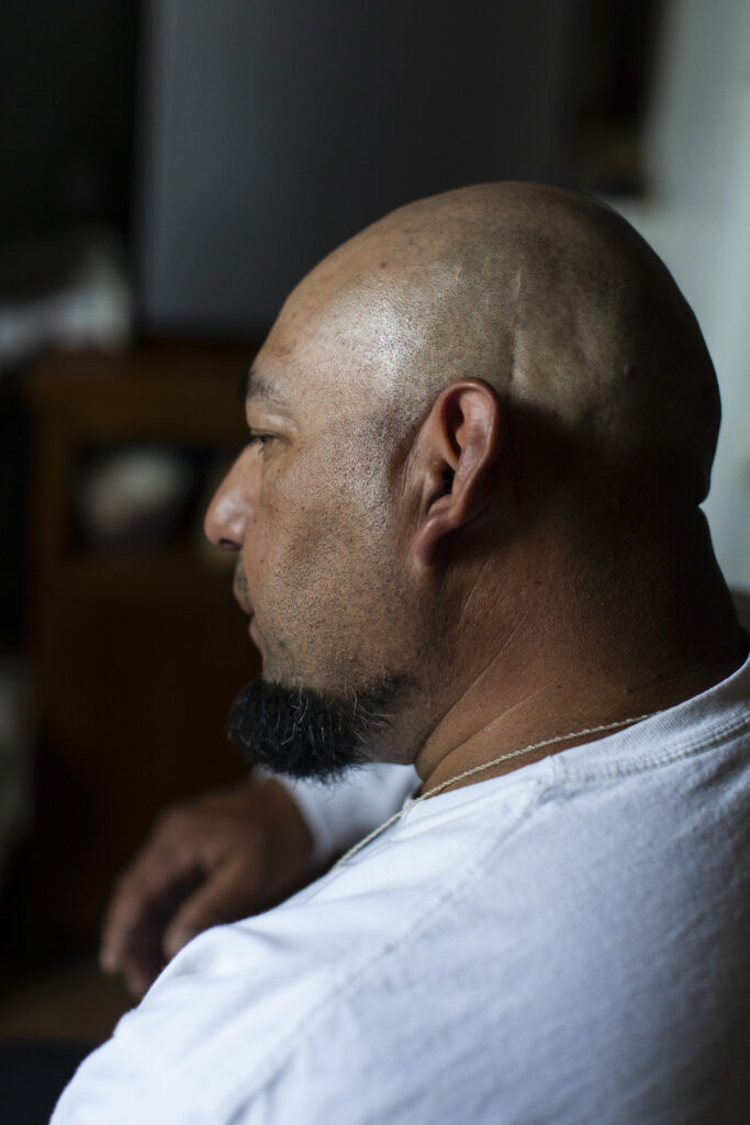 A day after confirming a cancer treatment plan for a brain tumor, D.E. was forcibly detained by ICE without a warrant two blocks from his home.
