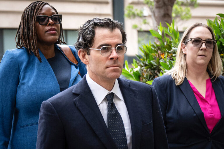 Adam Mosseri (C), head of Instagram, arrives at the Ronald V. Dellums Federal Building & United States Courthouse as Meta is on trial over social media addiction in Oakland, California, on August 25, 2026. A coalition of US states is seeking around $200 billion in damages against Meta, which they accuse of intentionally designing Facebook and Instagram to be addictive for children, in a landmark trial. (Photo by Karl Mondon / AFP via Getty Images)