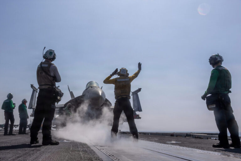 An F/A-18E Super Hornet prepares to launch from the flight deck of the aircraft carrier USS Abraham Lincoln in support of Operation Epic Fury on Feb. 28, 2026.