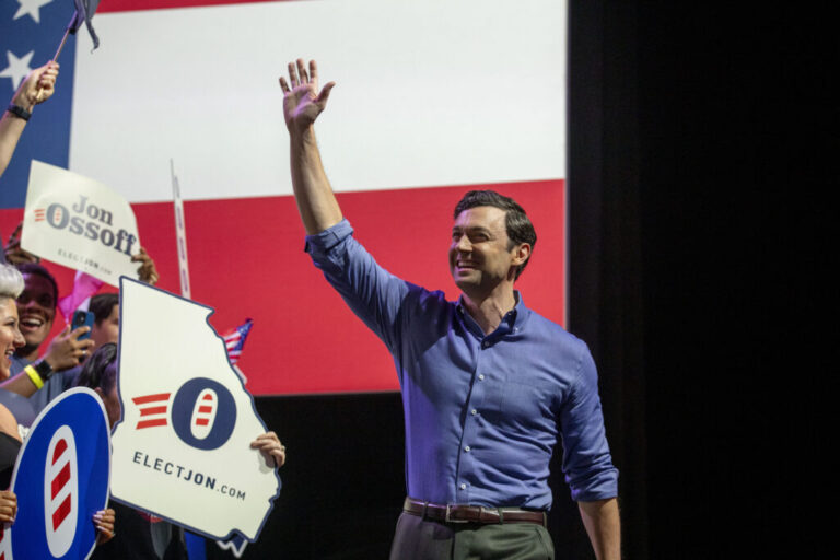 Sen. Jon Ossoff greets supporters before speaking during a campaign rally at Center Stage in Atlanta on August 16 2026.