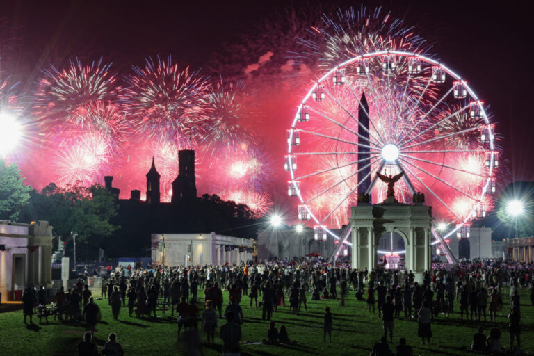 Spectators on the National Mall watch fireworks on July 4. The Trump administration has asked Congress for an additional $10 to pay for the fireworks show, the Great American State Fair and a prayer event on the mall.