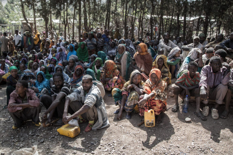 Ethiopians wait for their ration of food supplies in February. The U.N.'s World Hunger Programme reports that