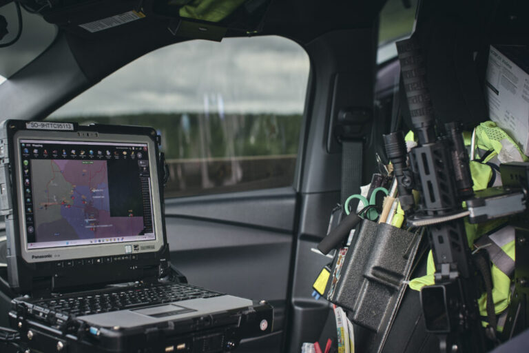 This photo shows the interior of Sgt. Oscar D’Lassalas' SUV. In it, among other items, is a laptop computer with a map on its screen.