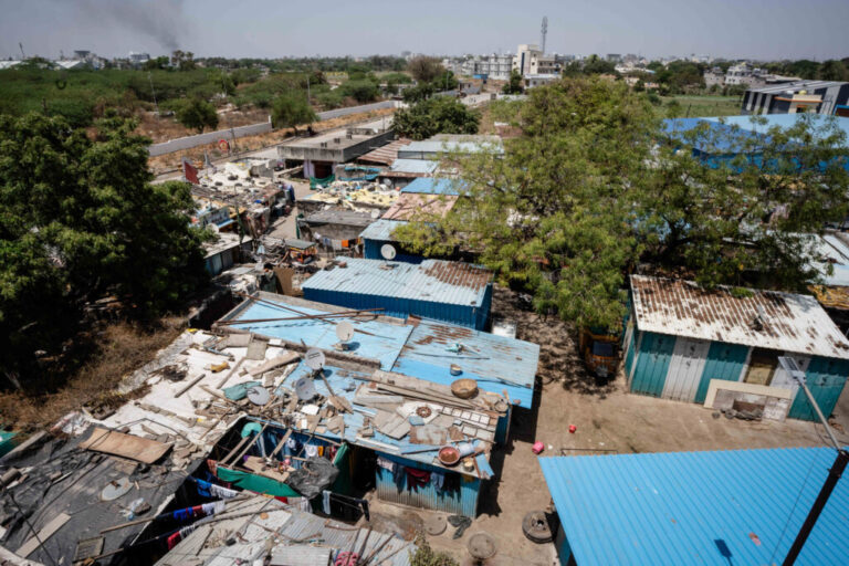 A bird's eye view of the Sanjaynagar slum in the city of Ahmednagar , from the new redeveloment, Swapnapurti's terrace. Roughly, 900 people live in 206 metal shacks or dwelling units.
