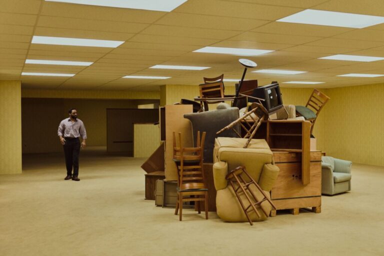 Chiwetel Ejiofor plays Clark, a furniture store owner who wanders into a mysterious storage space in Backrooms.