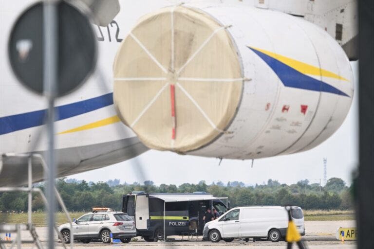 Police forensic technicians work near a Ukrainian aircraft at Leipzig/Halle Airport, where a drone with an explosive device was found and a detonator was removed from the object, in Schkeuditz, Germany, Wednesday Aug. 5, 2026.