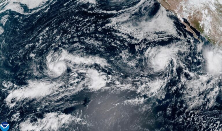 This satellite image from the National Oceanic and Atmospheric Administration (NOAA) shows Tropical Storm Nolo, left, south of Hawaii; Hurricane Odalys, middle, and Hurricane Polo, right, off the coast of Mexico, in the Pacific Ocean on Thursday, Sept. 24, 2026.