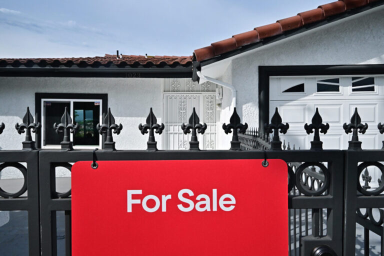 A 'for sale' sign is seen on a house in Monterey Park, California, on September 17, 2025.