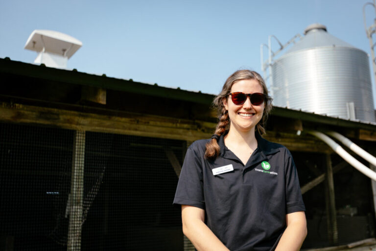Katherine Jernigan of Transfarmation stands in front of an unused pig shed.