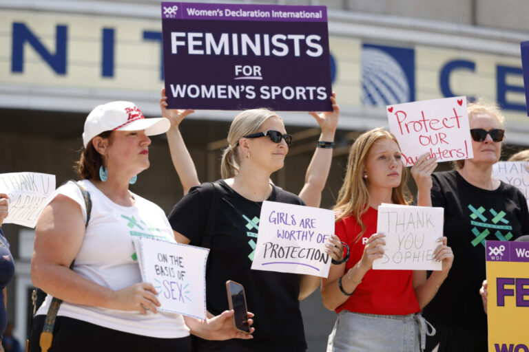 Demonstrators protest outside the United Center in Chicago prior to the game between the Chicago Sky and the Indiana Fever on Aug. 8, 2026.