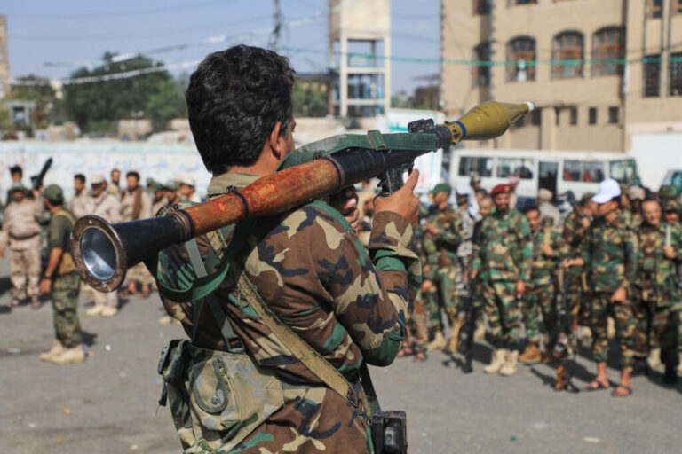 A fighter with Yemen’s Houthi rebels carries a rocket-propelled grenade launcher as they march during a mobilization campaign in Sanaa, Yemen, Thursday.