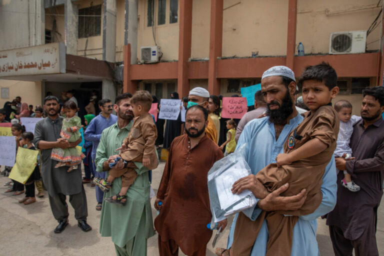 Parents of children who tested positive for HIV after receiving care at Kulsum Bai Valika Hospital hold a protest there on July 23, 2026 in Karachi, Pakistan. These families receive care at Valika Hospital through a provincial social security program run by the labor ministry. Most of the parents of children infected with HIV are low-income factory workers.