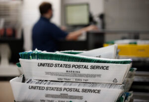 Whistleblower claims USPS plan for Trump’s mail voting order could ‘derail’ midterms