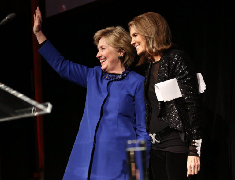 Former Secretary of State Hillary Clinton — here posing with Gloria Steinem in 2017 — was one of many cultural figures to pay tribute after her death on Wednesday.