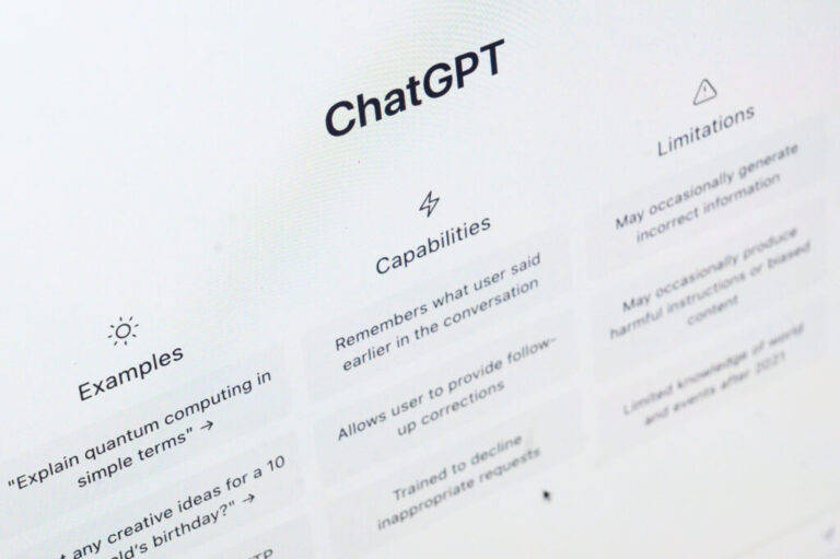 In this photo illustration, the home page for OpenAI's ChatGPT app is displayed on a laptop screen on Feb. 3, 2023. This week, OpenAI said it used its own AI models to detect covert influence operations.